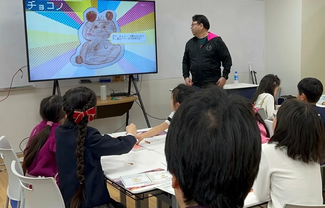 イベント会場で子どもたちがアプリを体験する様子